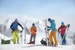 Backcountry skiers getting gear ready