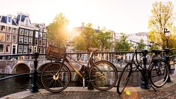 Bicycle by the canal in Amsterdam, Netherlands